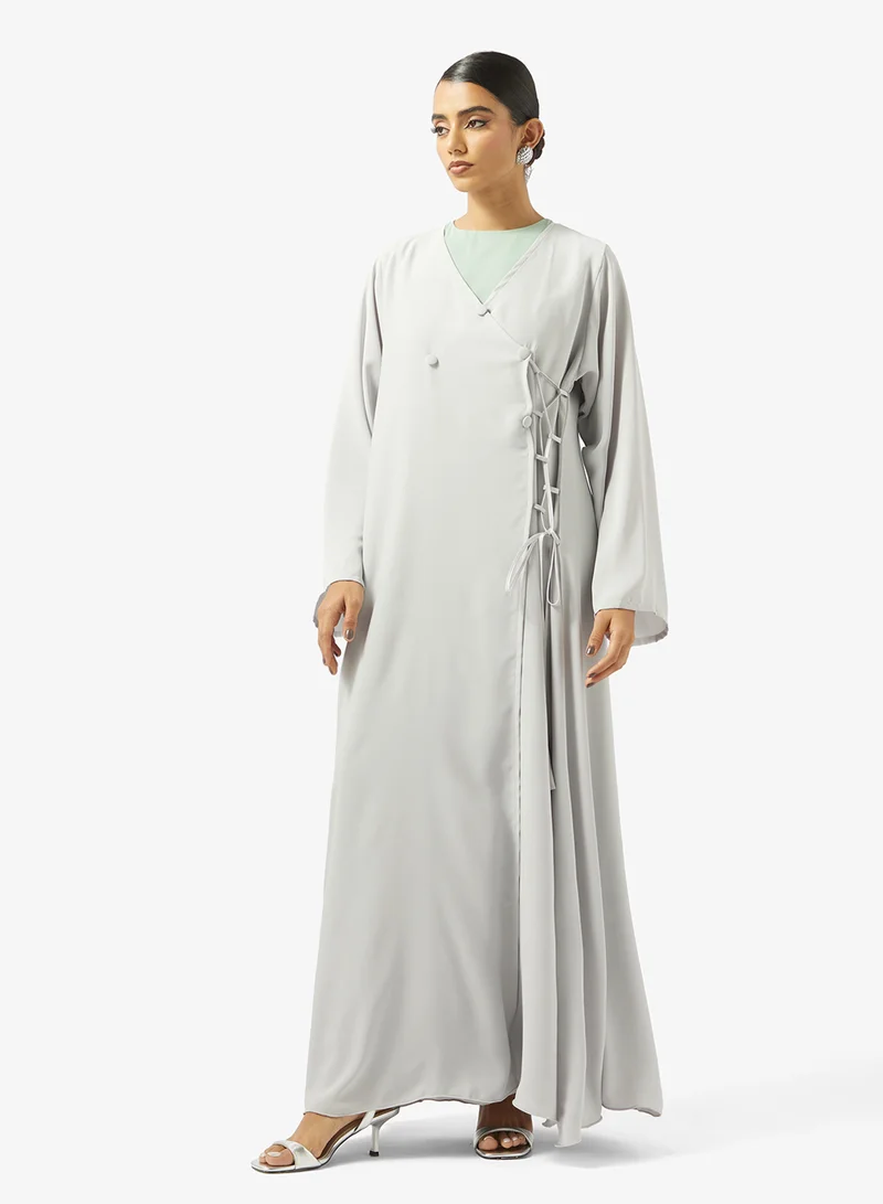 hayas closet  Abaya with Crossover loops details for Women | Best Price UAE